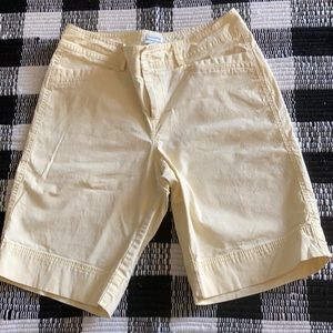 Dockers.  Mid rise- curvy short